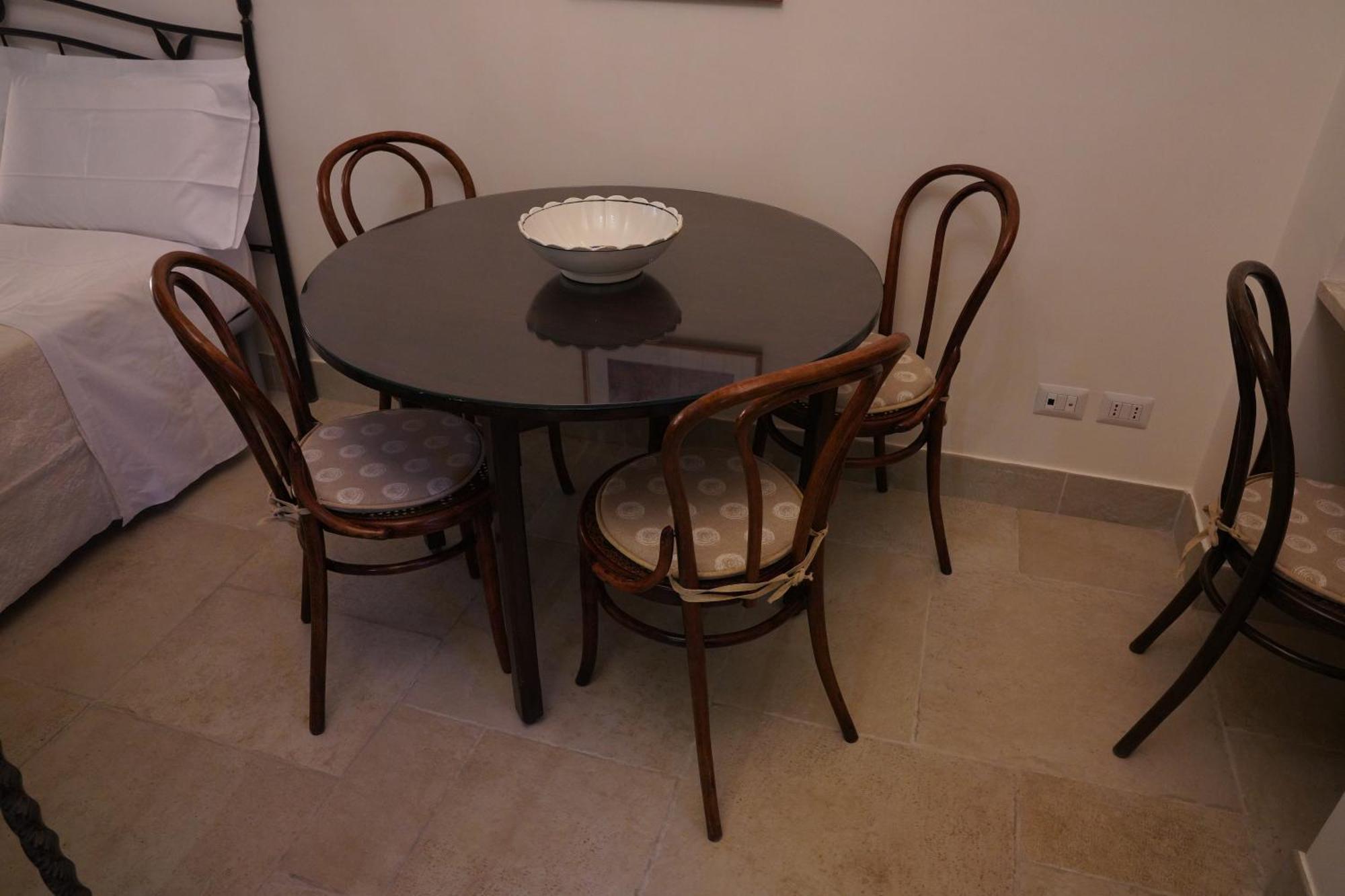 Ui Momm Hotell Matera Rum bild